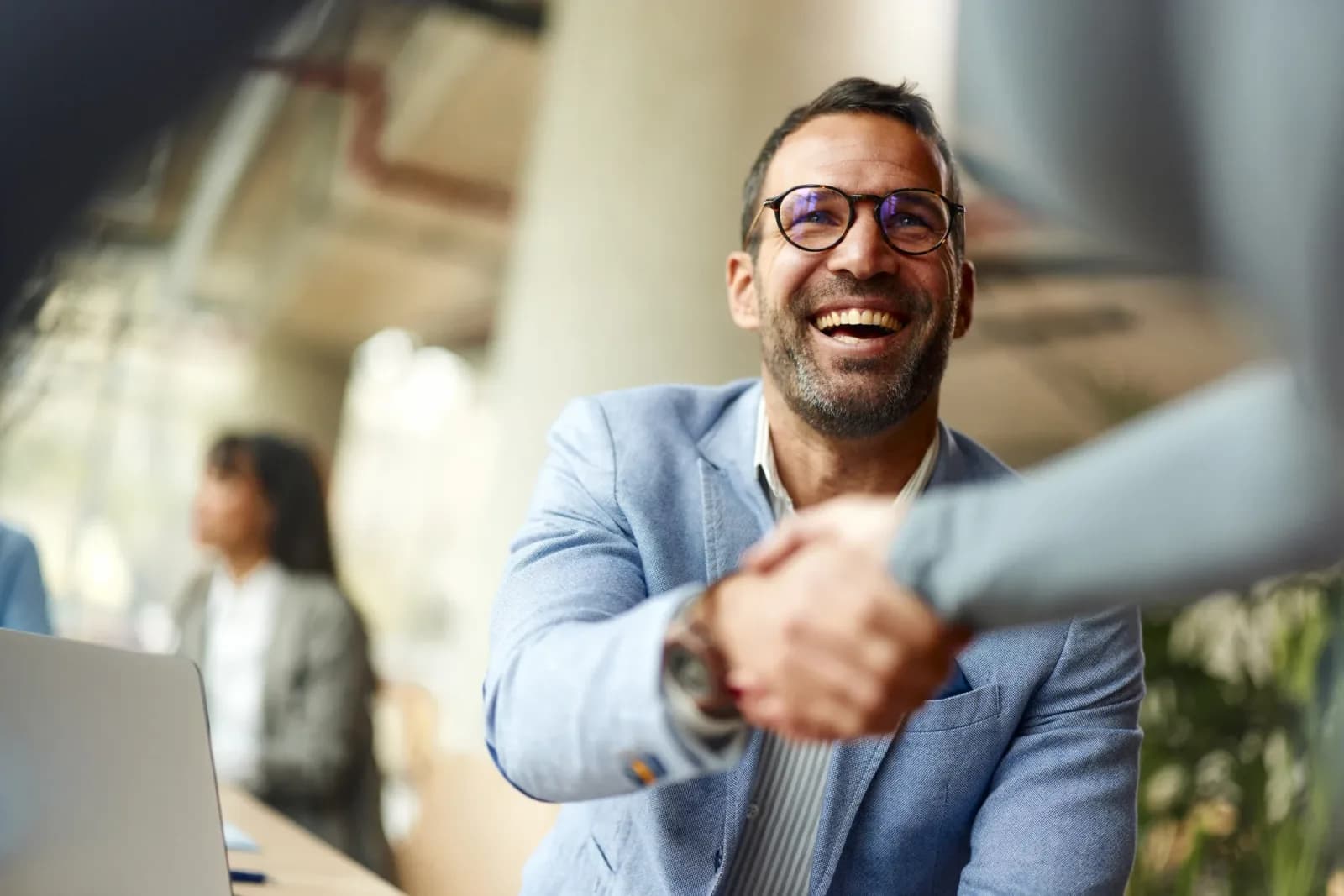 Happy_Business_Man_iStock-2184295789-2048x1366